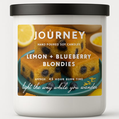 Lemon and Blueberry Blondies handmade soy candle in a white glass tumbler jar with a black lid.